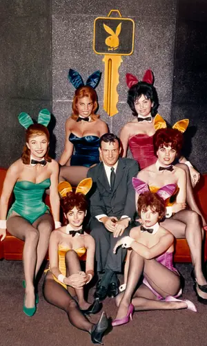 Hugh Hefner and Playboy Bunnies in a Playboy Club