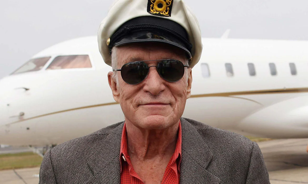 Hugh Hefner surrounded by Playboy archive material